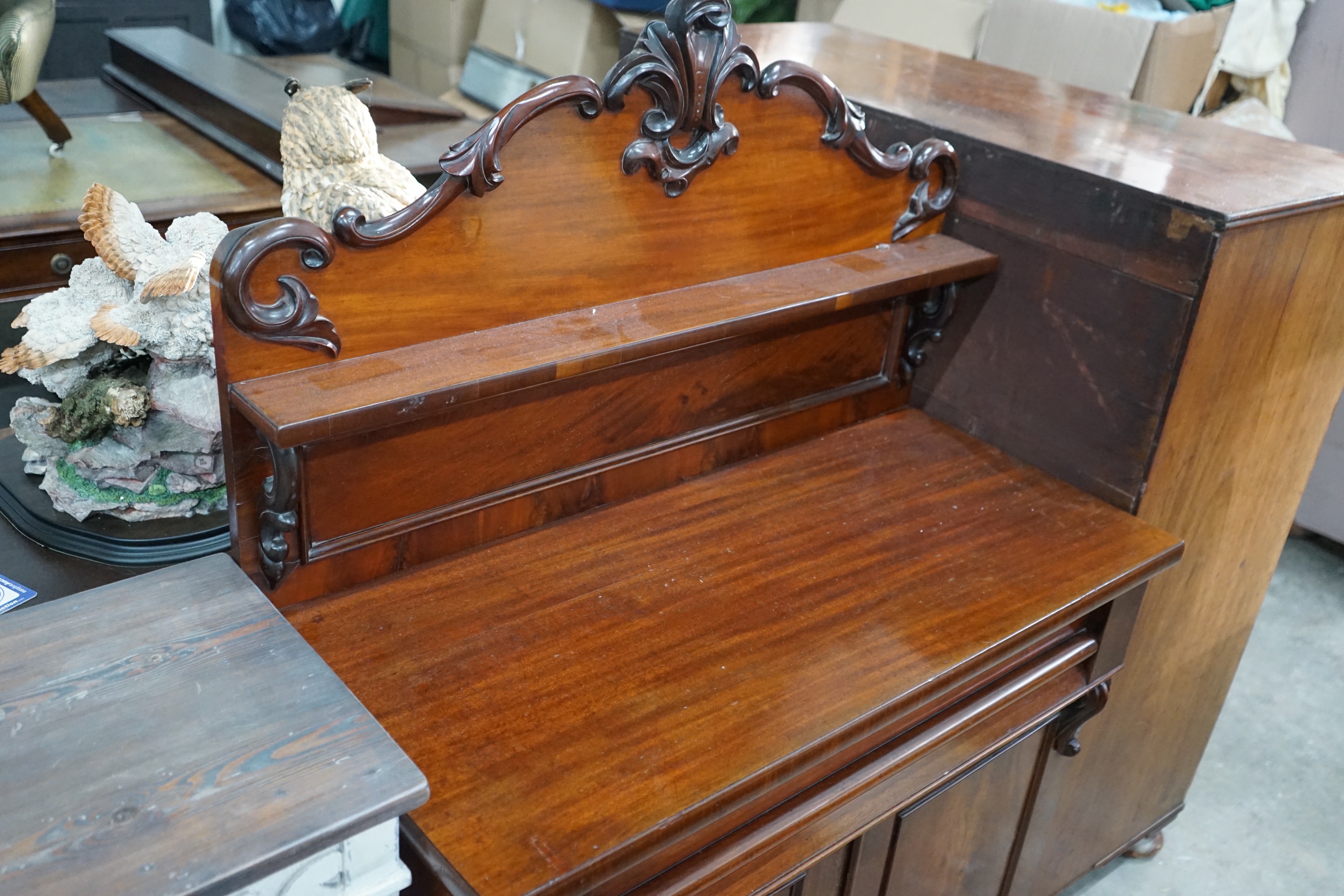 A small Victorian mahogany chiffonier, width 100cm, depth 46cm, height 140cm